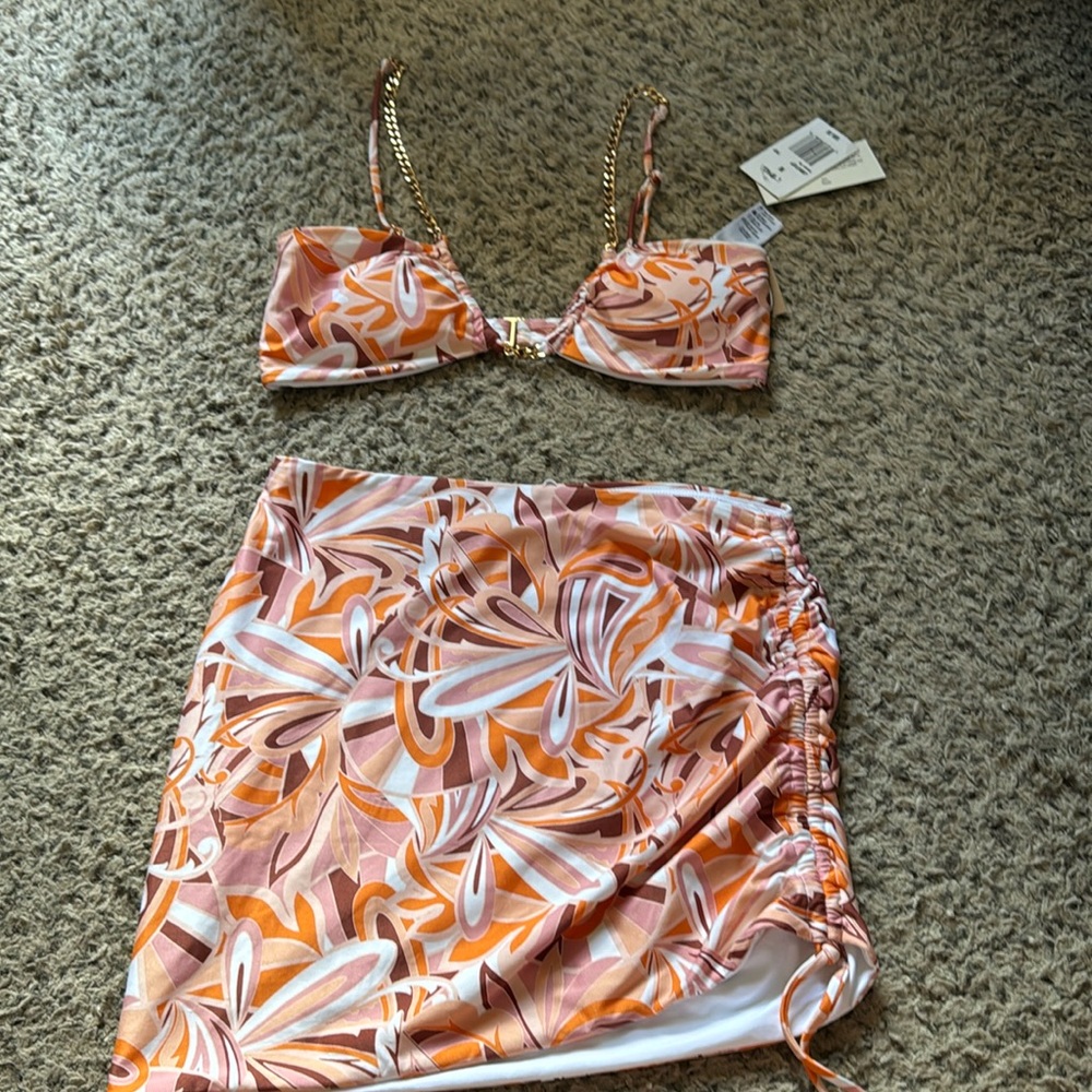 L* Space bikini top and cover up skirt.